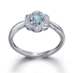Anillo Jolie Fleur Oro blanco 18 kts brillantes y topacio